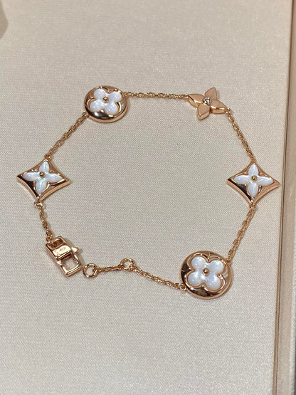 [Glimmer]STAR AND SUN 5 MOTIF MOP PINK GOLD BRACELET