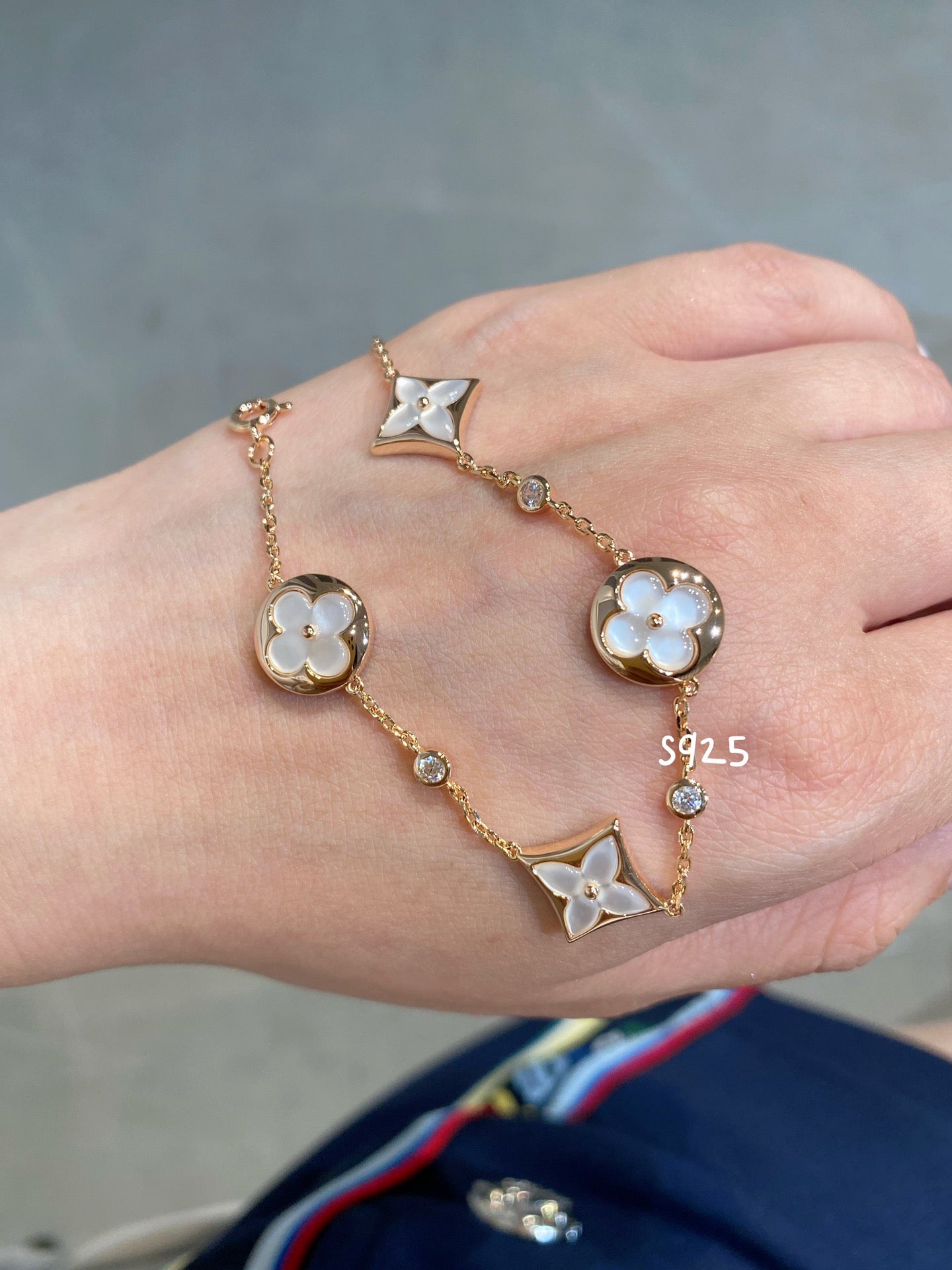 [Glimmer]STAR AND SUN 4 MOTIF WHITE MOP PINK GOLD BRACELET