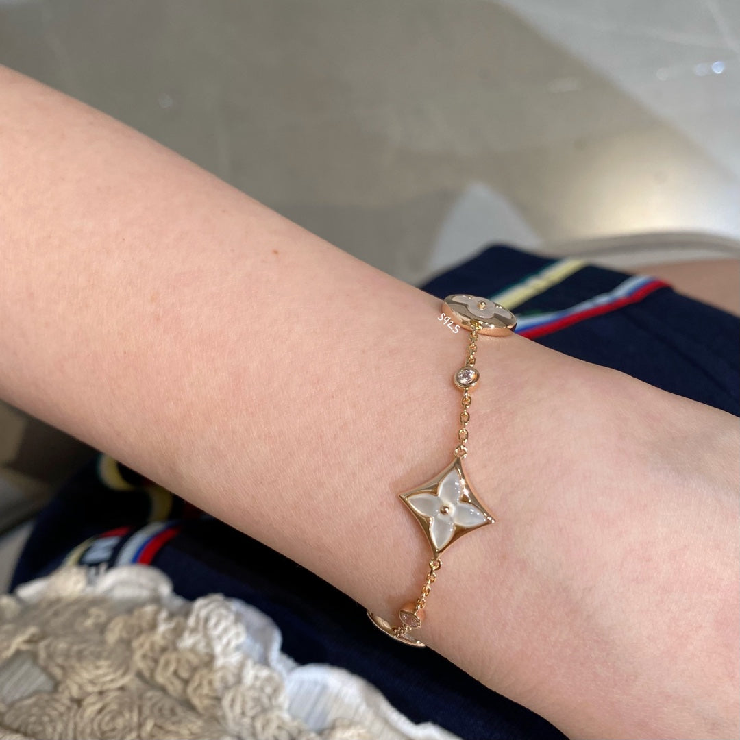 [Glimmer]STAR AND SUN 4 MOTIF WHITE MOP PINK GOLD BRACELET
