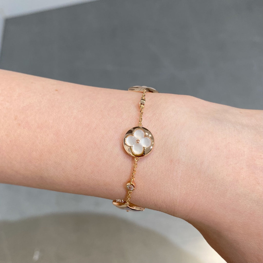 [Glimmer]STAR AND SUN 4 MOTIF WHITE MOP PINK GOLD BRACELET