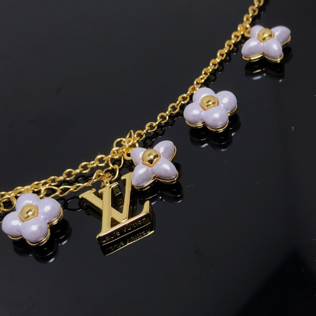 [Glimmer]LOGO 6 MOTIF STAR AND SUN GOLD BRACELET